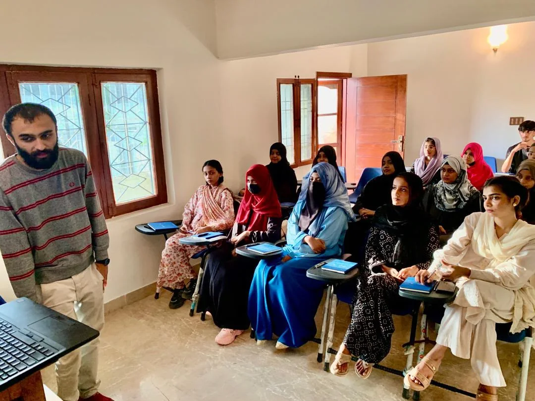 A SOCH instructor presenting to students during a classroom session in Karachi.