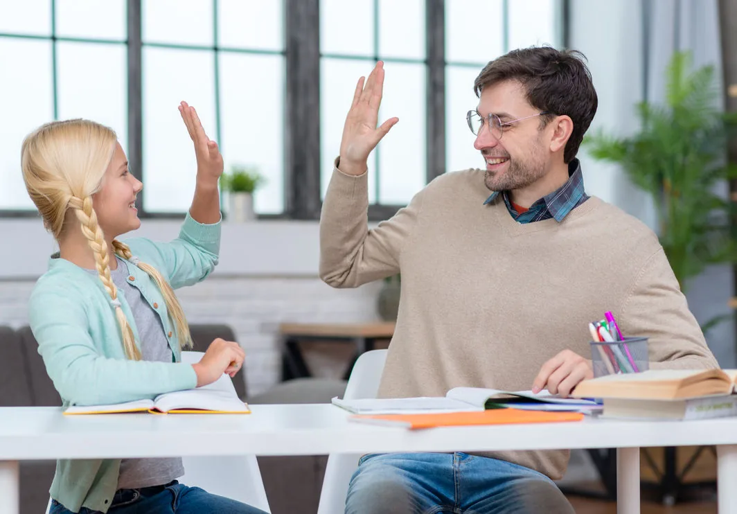 A teacher recognized at the close of a training program